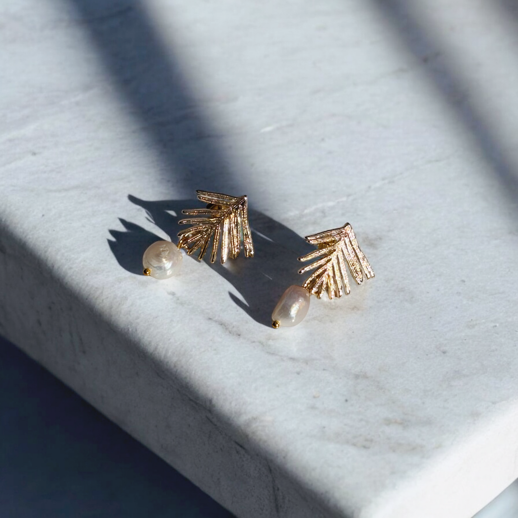 pearly palm dangles